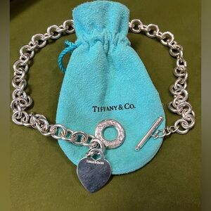 Authentic Tiffany and Co. 925 Sterling Silver 16” heart toggle tag necklace.